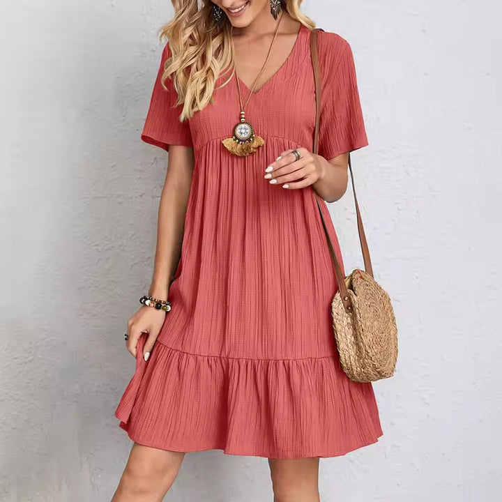 Schlichtes Kleid mit femininer Form